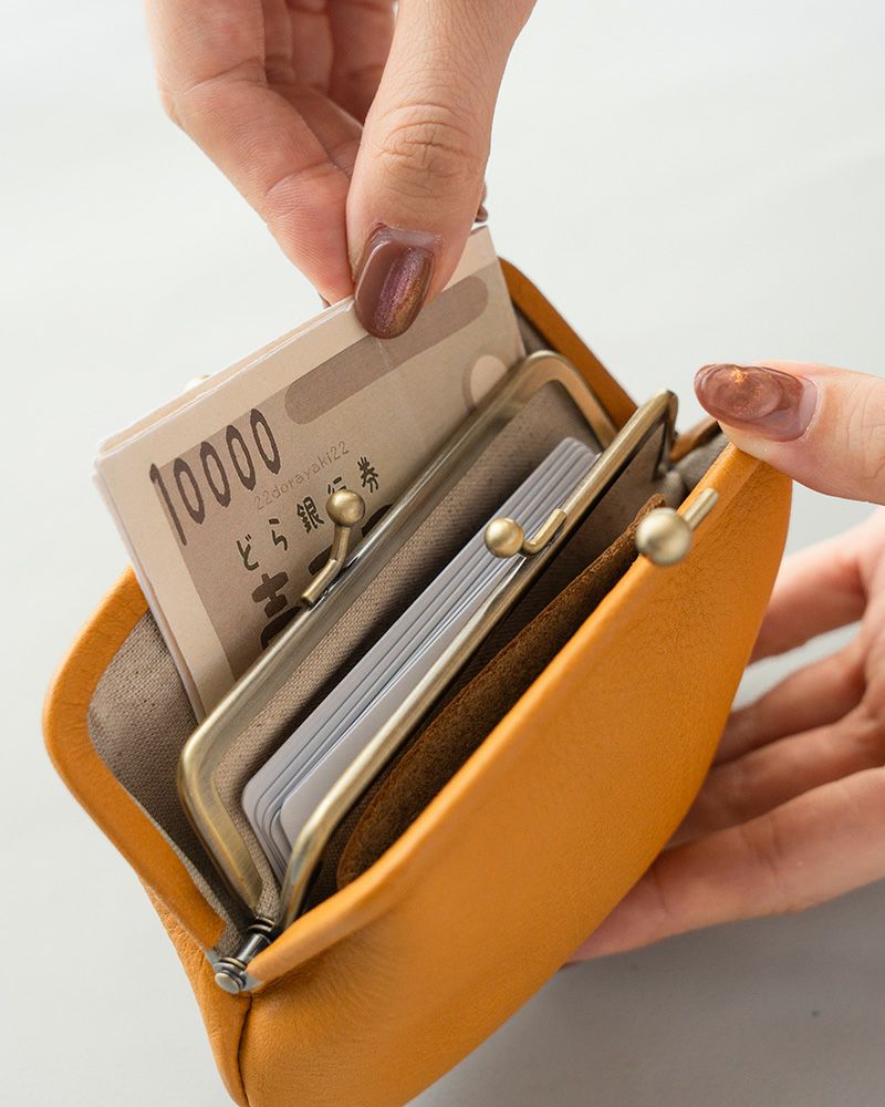 お札は2つ折りで入ります「itsu mono 親子がま口」マスタード